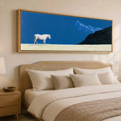 Solitude in Blue Horse Landscape panoramic canvas wall art displayed above a bed