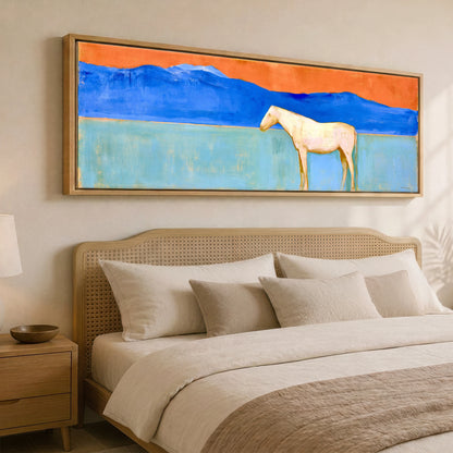 Terracotta Sky Solitude Horse Landscape panoramic canvas wall art displayed above a bed