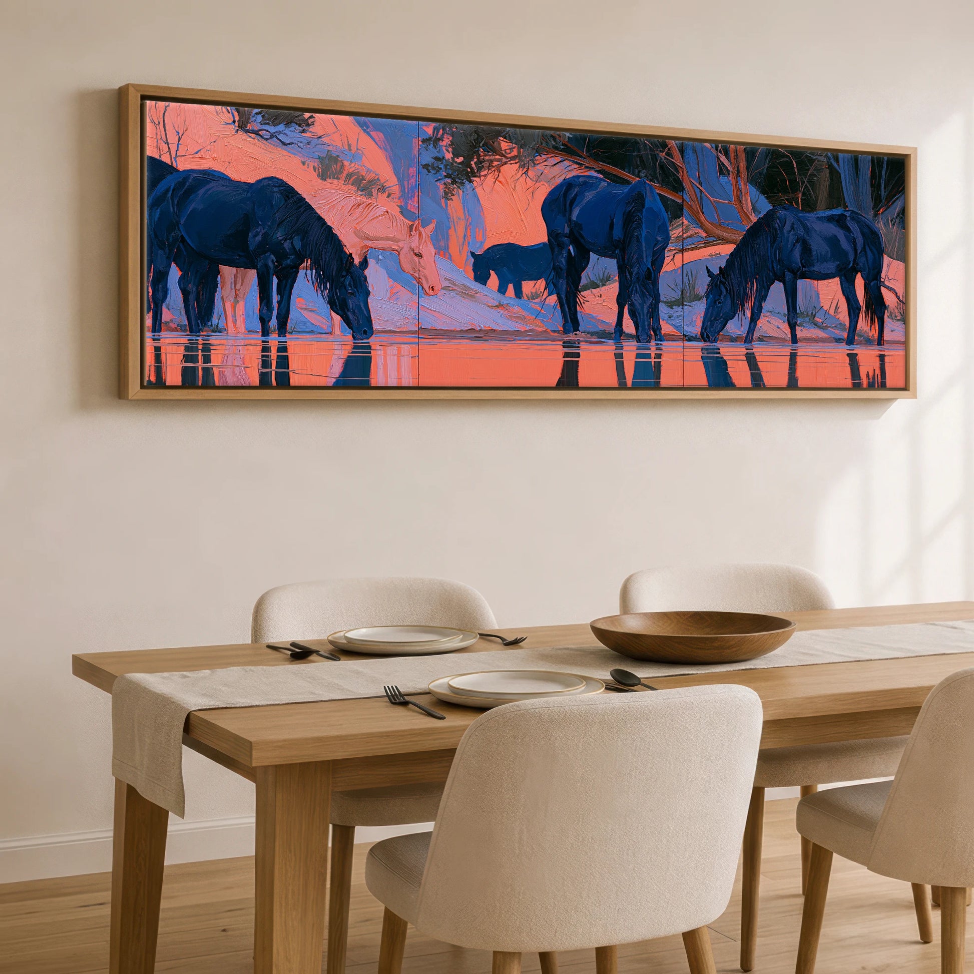Indigo Herd in Winter Light Wild Horses panoramic canvas wall art displayed above a dining table