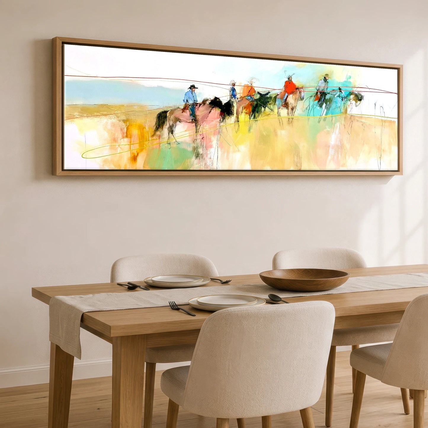 Across the High Plains Horse & Rider panoramic canvas wall art displayed above a dining table