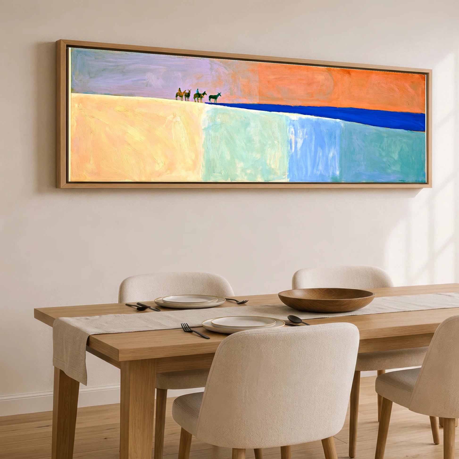The Cobalt Horizon Horse & Rider panoramic canvas wall art displayed above a dining table