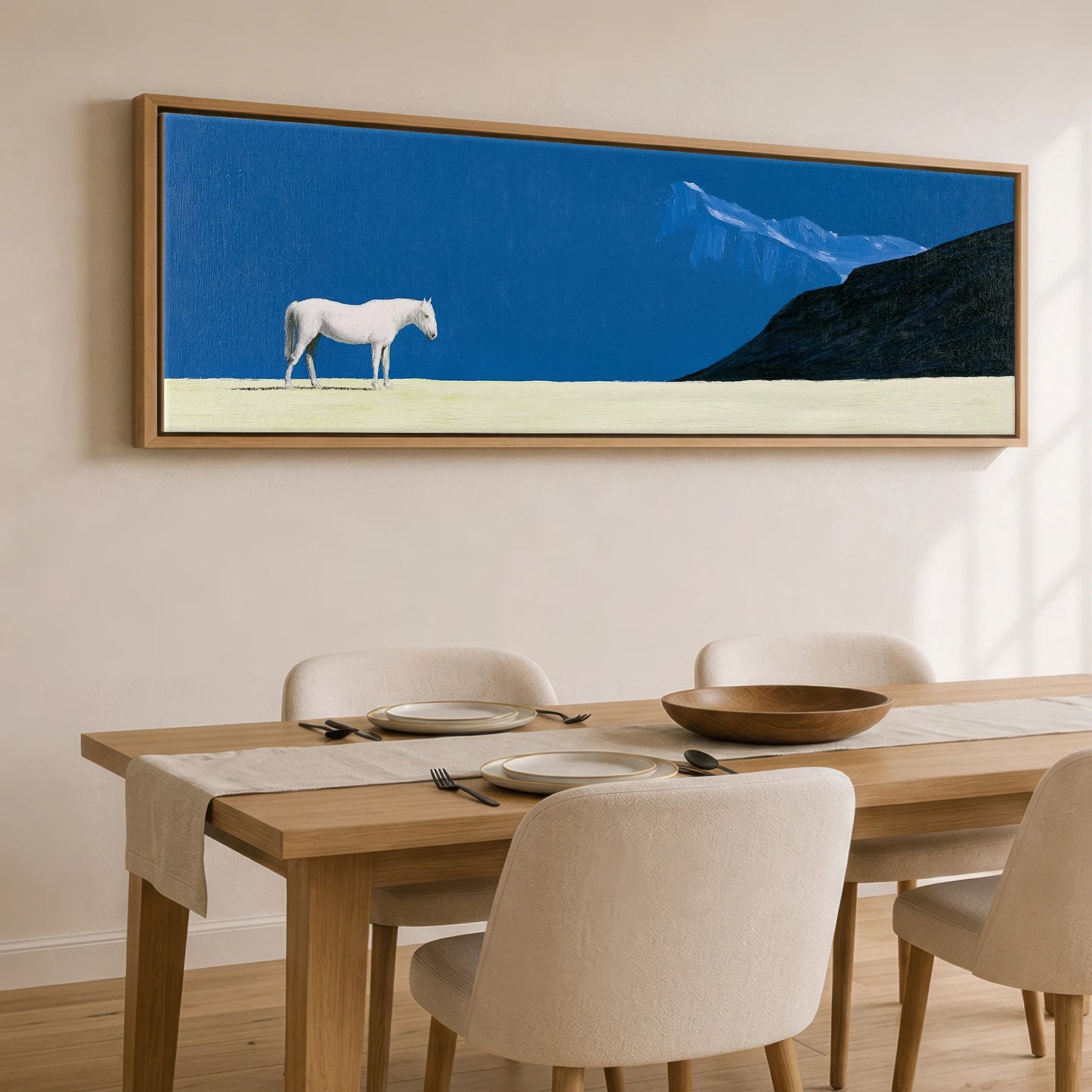 Solitude in Blue Horse Landscape panoramic canvas wall art displayed above a dining table