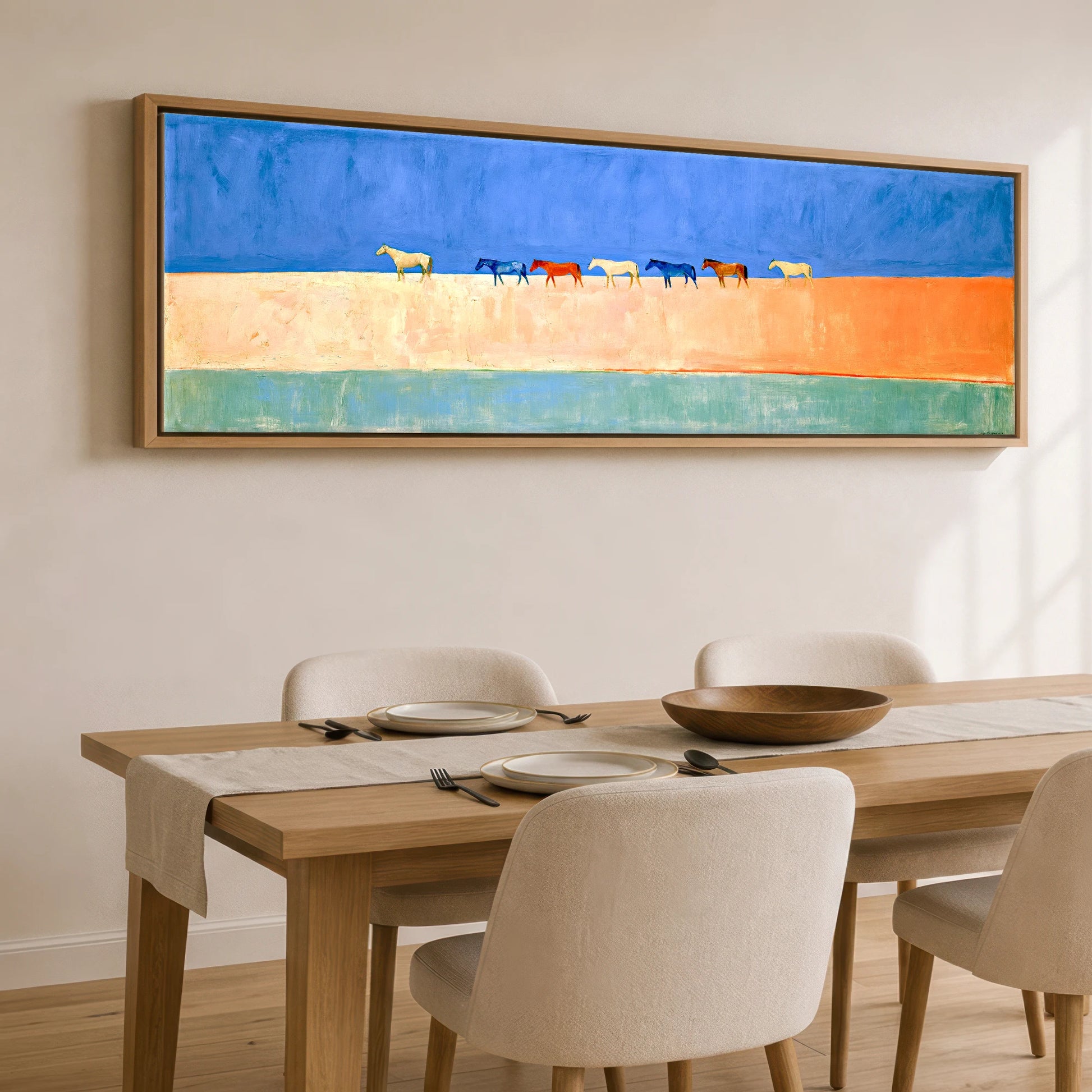 Nomads of the Horizon Wild Horses panoramic canvas wall art displayed above a dining table