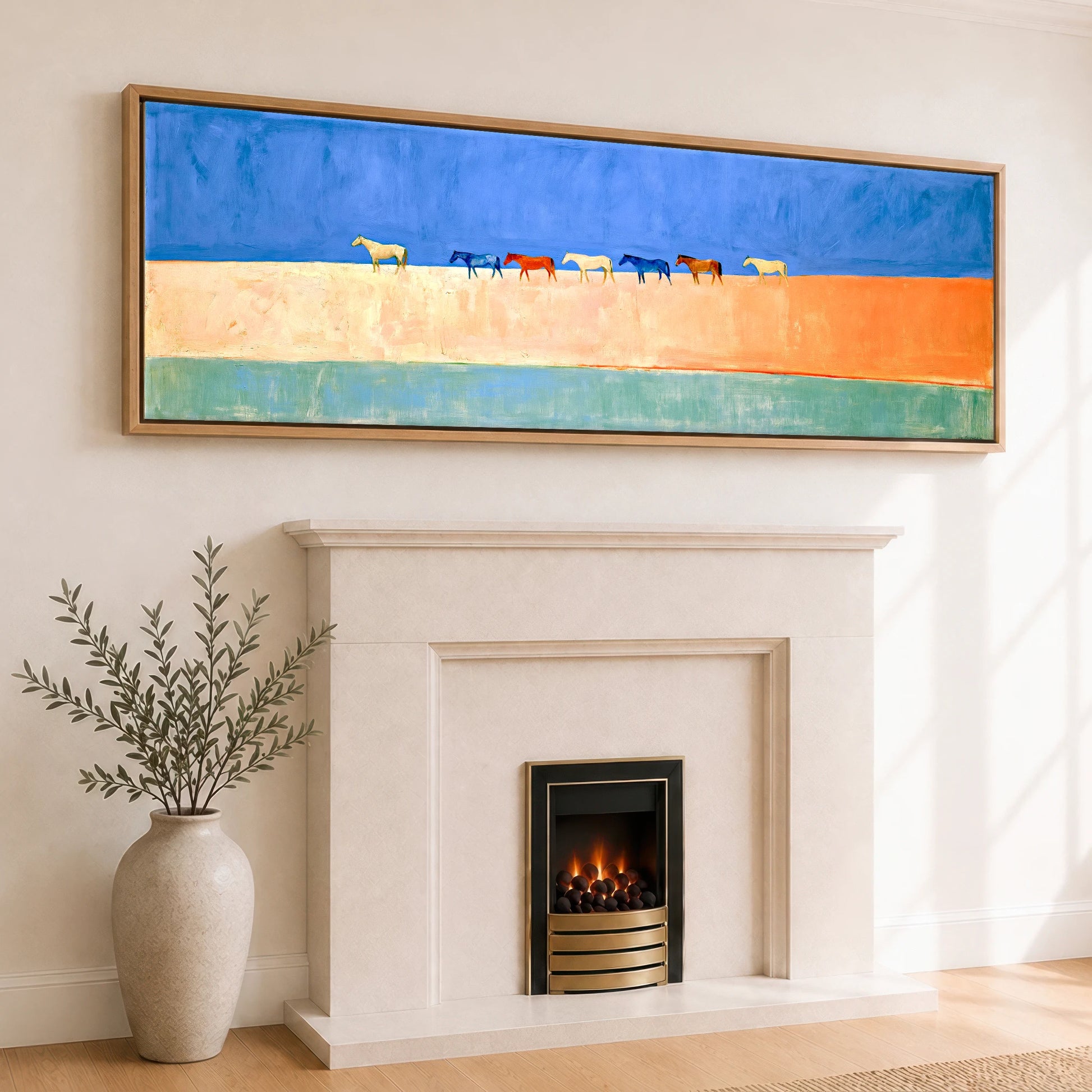 Nomads of the Horizon Wild Horses panoramic canvas wall art displayed above a fireplace