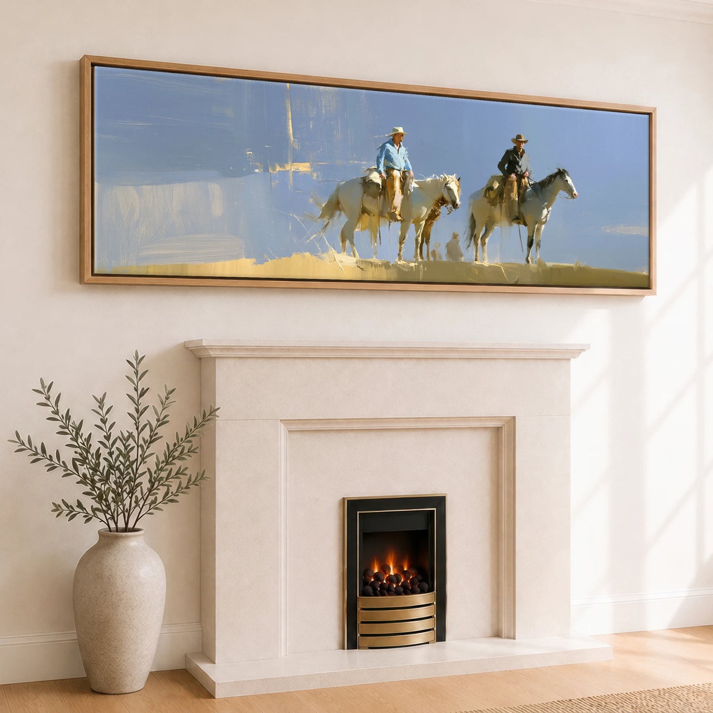 Sunlit Range Riders Horse & Rider panoramic canvas wall art displayed above a fireplace