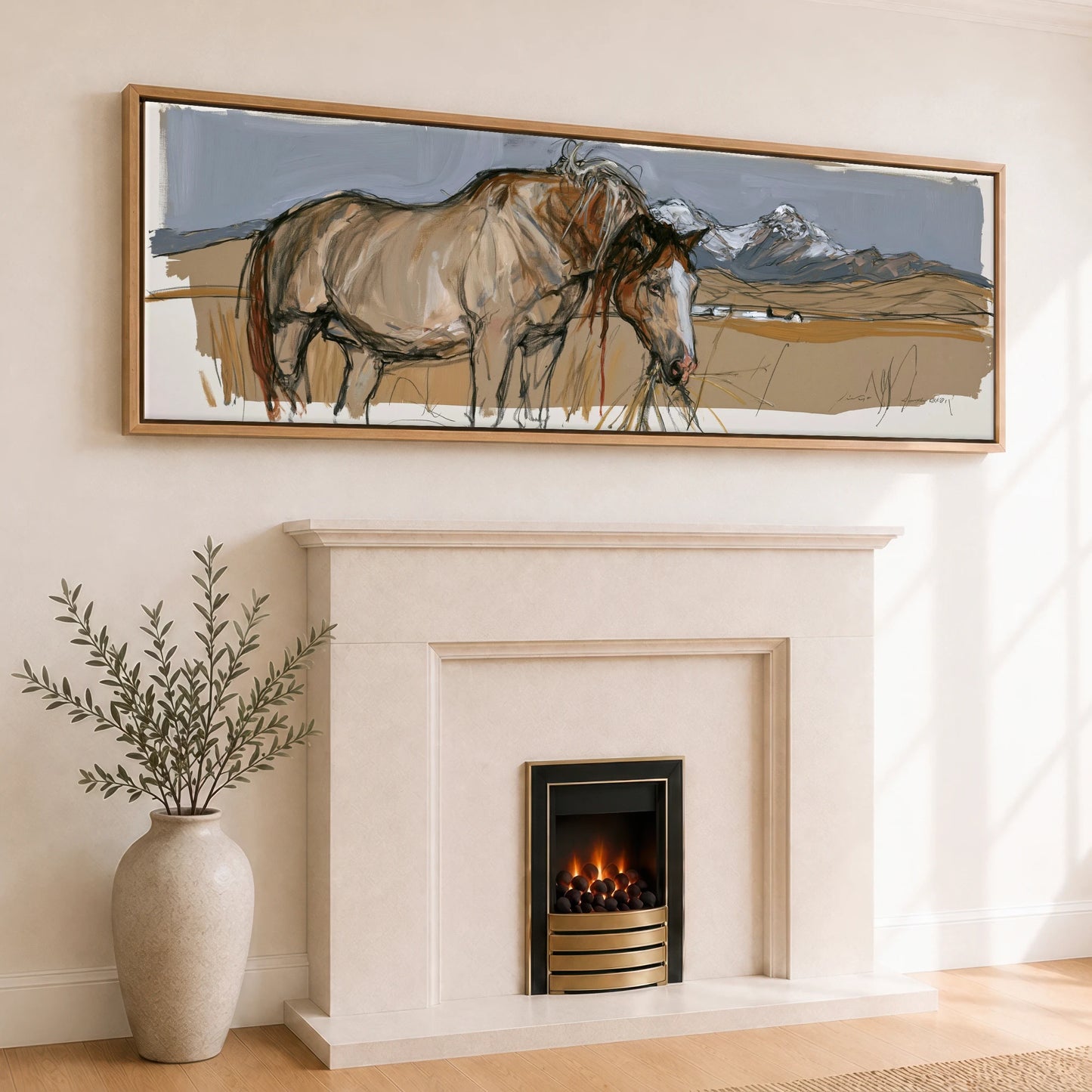 Grazing Below the Peaks Horse Landscape panoramic canvas wall art displayed above a fireplace