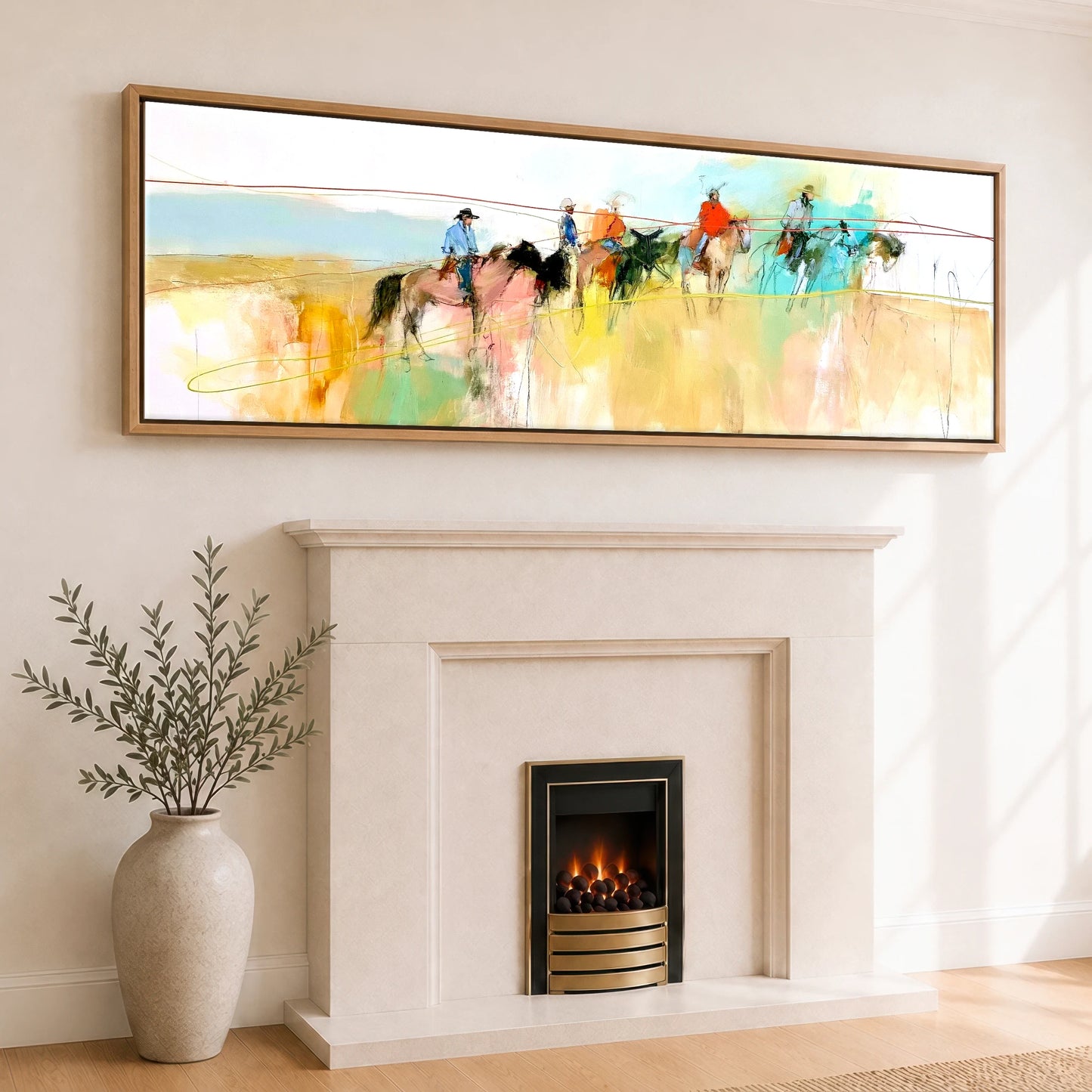 Across the High Plains Horse & Rider panoramic canvas wall art displayed above a fireplace