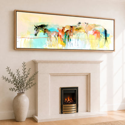 Vibrant Spring Herd Mare & Foal panoramic canvas wall art displayed above a fireplace