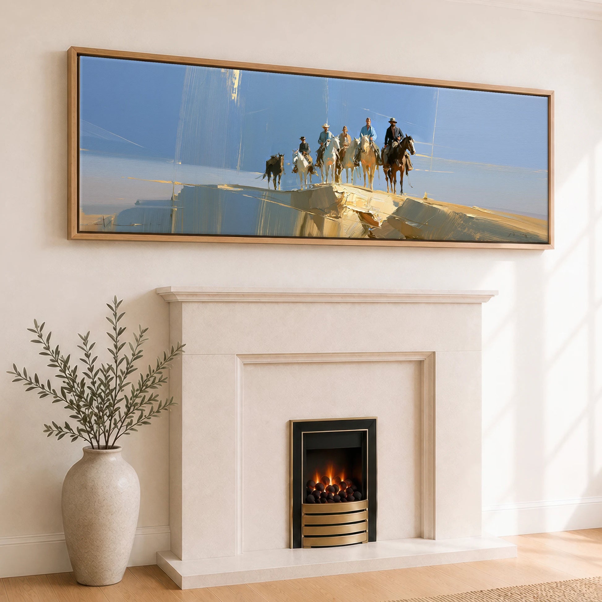 Cresting the Ridge Horse & Rider panoramic canvas wall art displayed above a fireplace