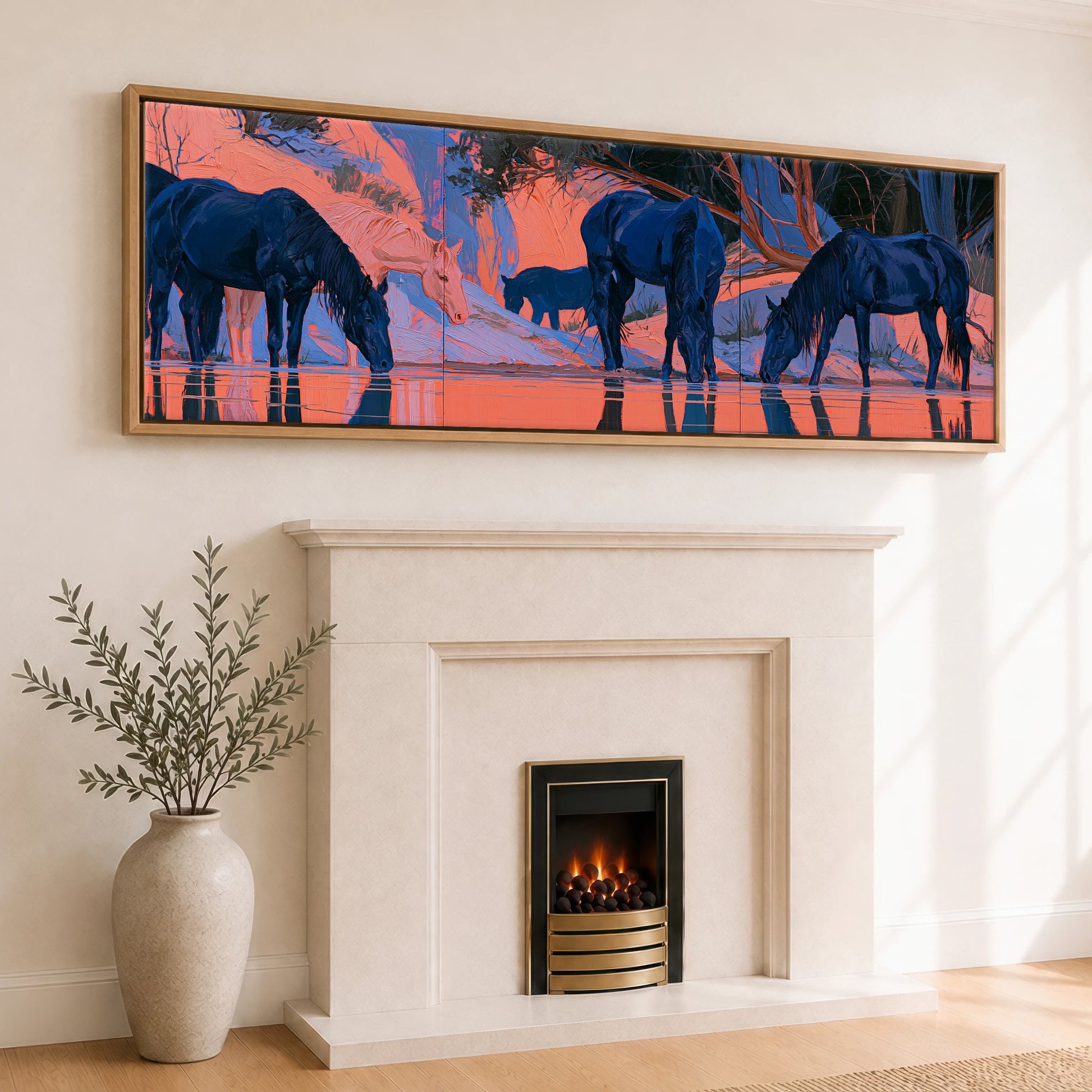 Indigo Herd in Winter Light Wild Horses panoramic canvas wall art displayed above a fireplace