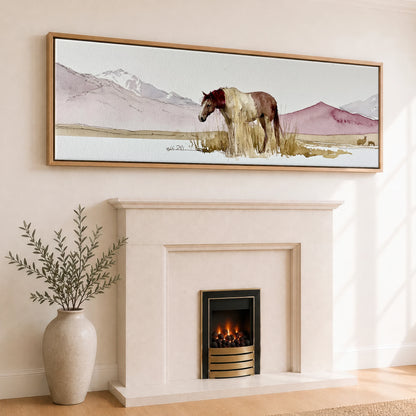 Quiet of the Range Horse Landscape panoramic canvas wall art displayed above a fireplace