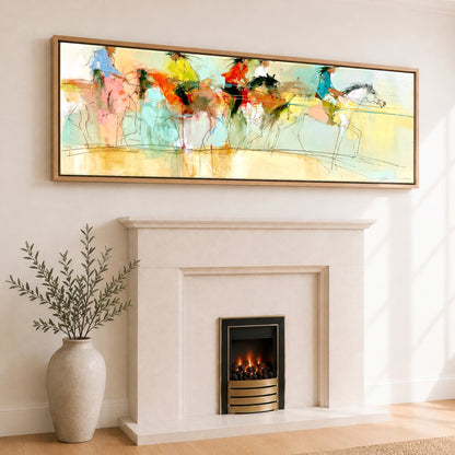 The Vibrant Canter Horse & Rider panoramic canvas wall art displayed above a fireplace