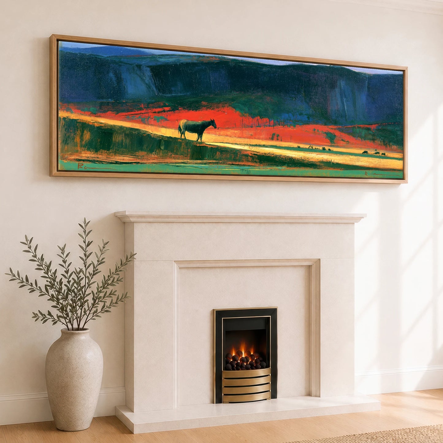 The Crimson Ridge Horse Landscape panoramic canvas wall art displayed above a fireplace