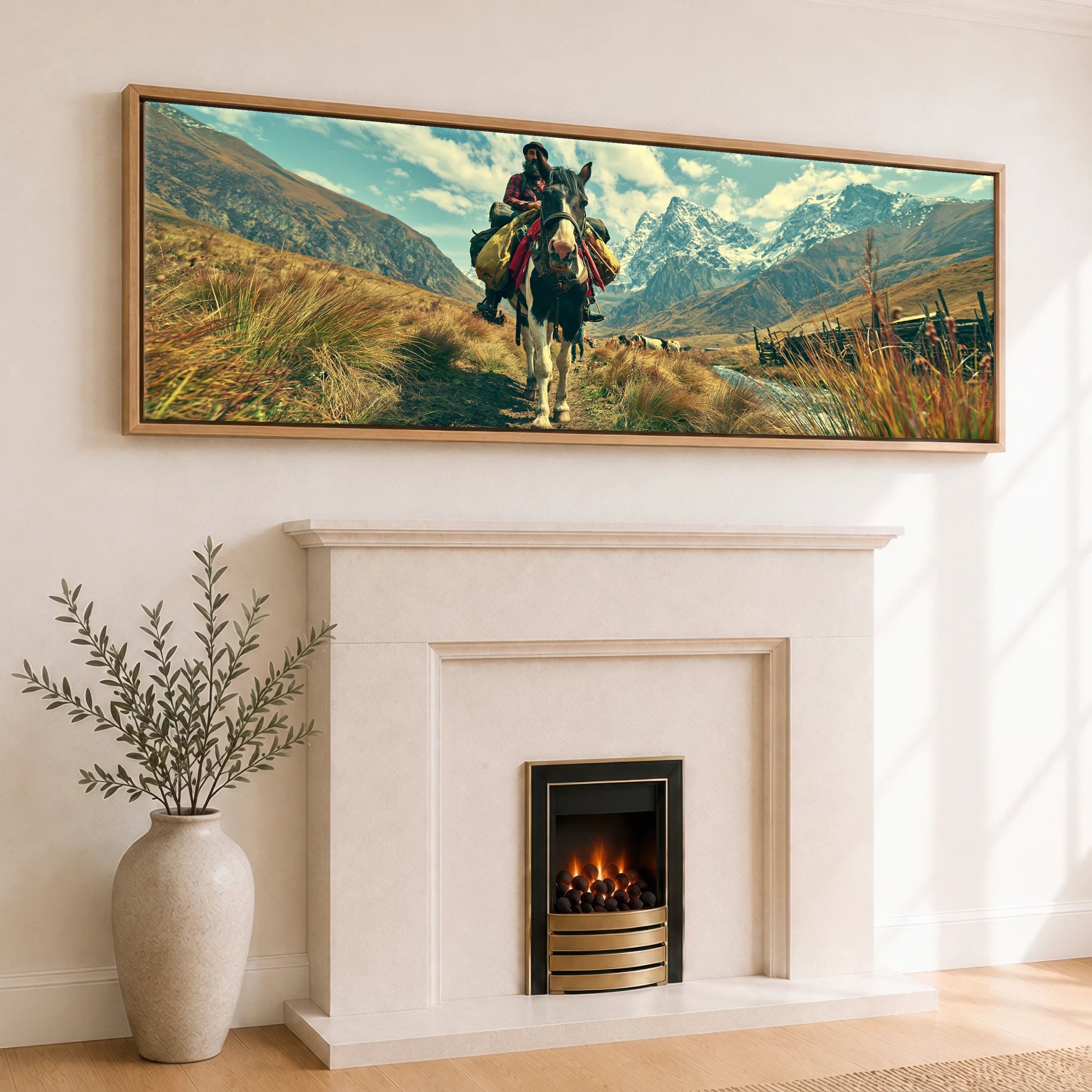 The High Pass Horse Landscape panoramic canvas wall art displayed above a fireplace