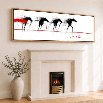 The Crimson Line Wild Horses panoramic canvas wall art displayed above a fireplace