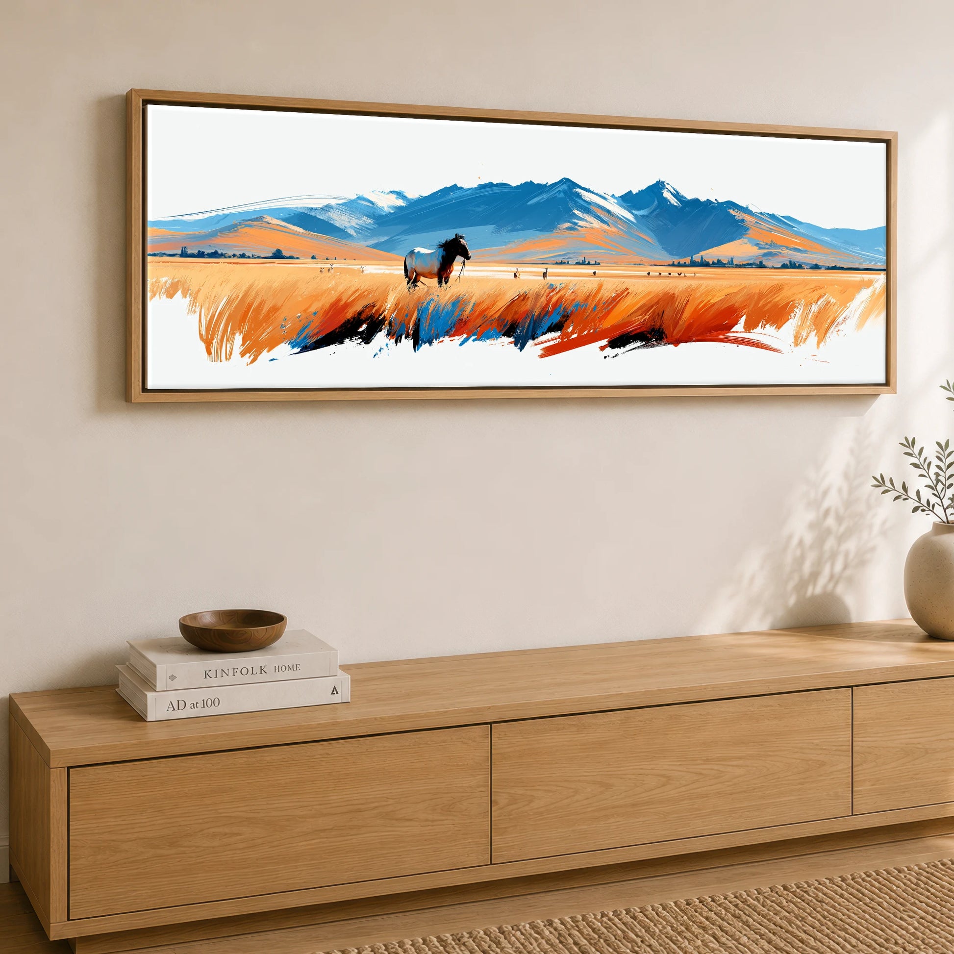 Painted Plains Horse Landscape panoramic canvas wall art displayed above a sideboard