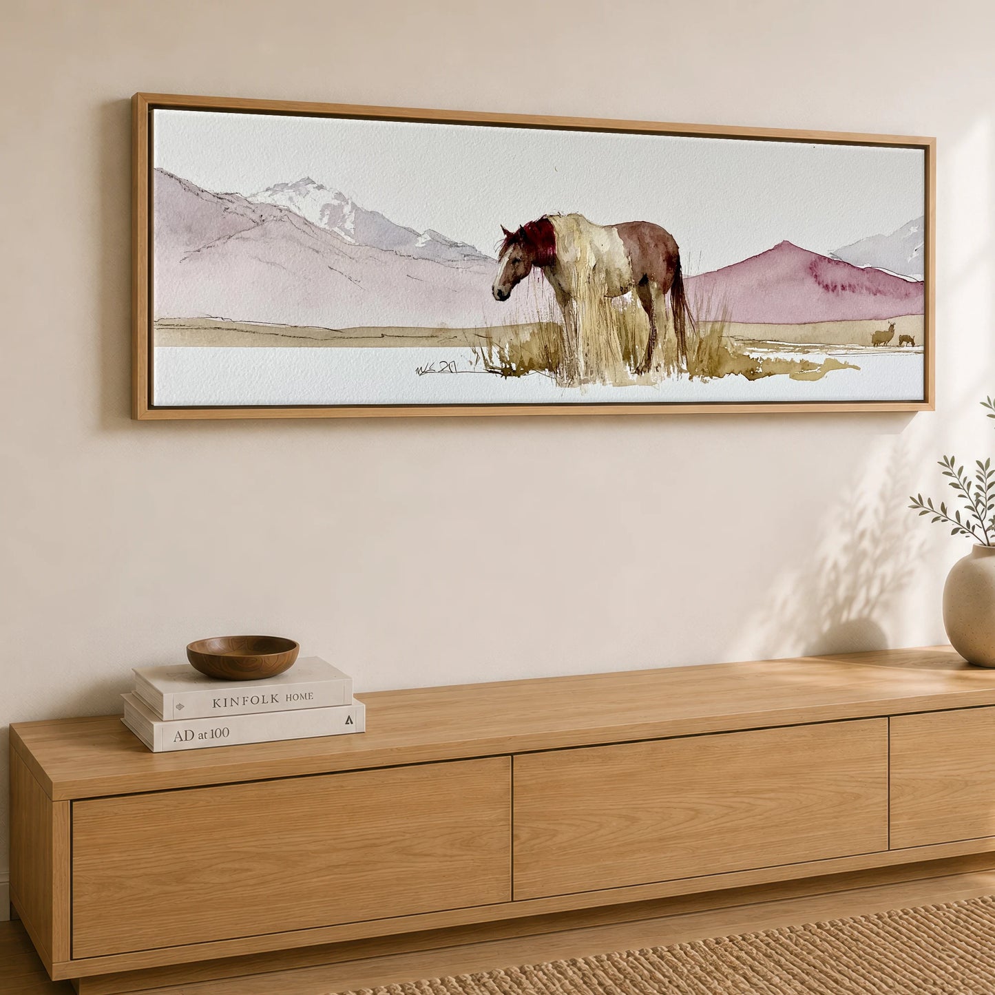 Quiet of the Range Horse Landscape panoramic canvas wall art displayed above a sideboard