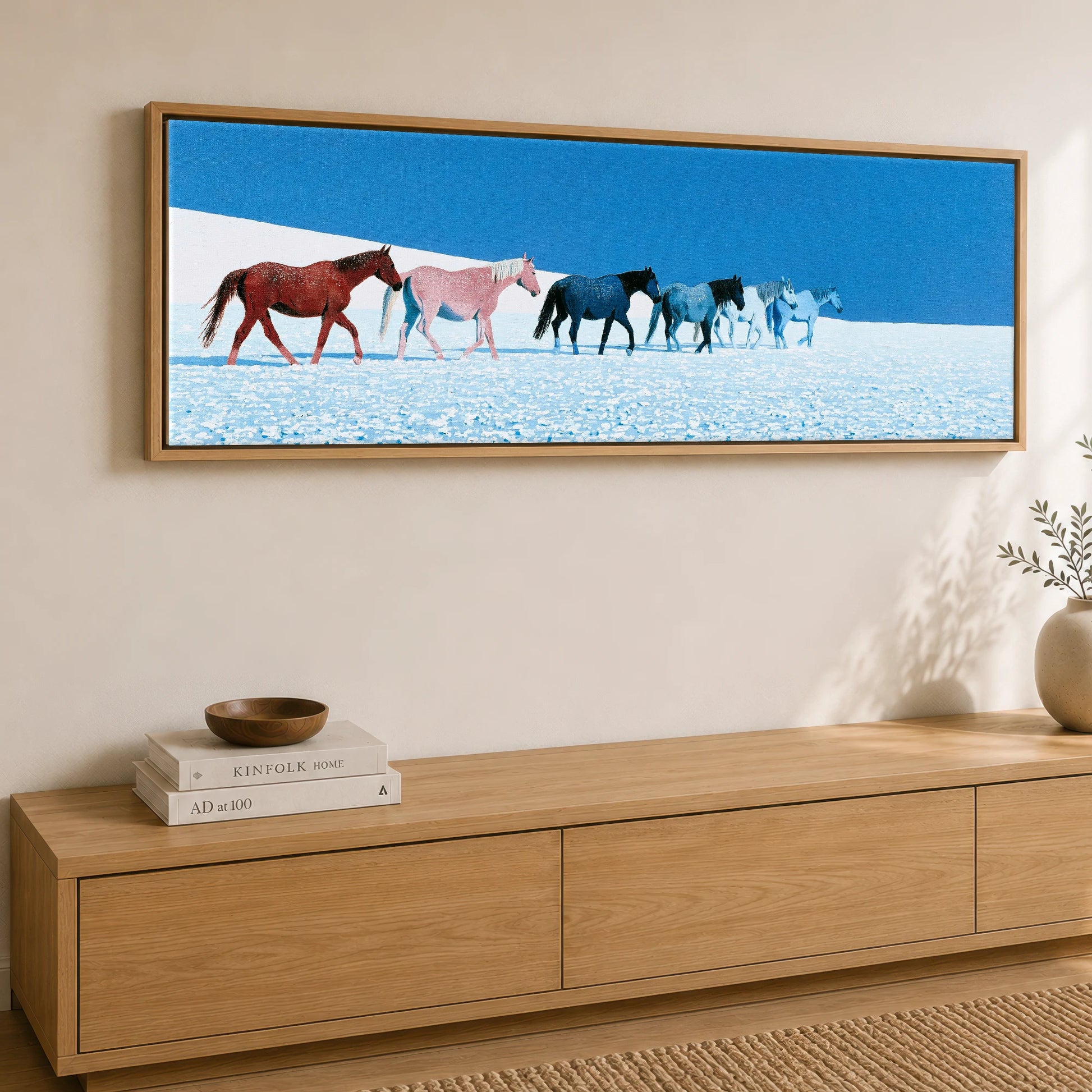 The Azure Procession Horse Landscape panoramic canvas wall art displayed above a sideboard