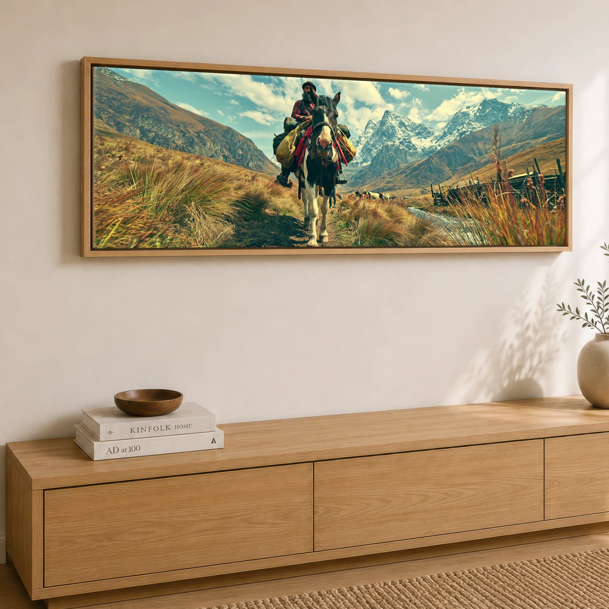 The High Pass Horse Landscape panoramic canvas wall art displayed above a sideboard