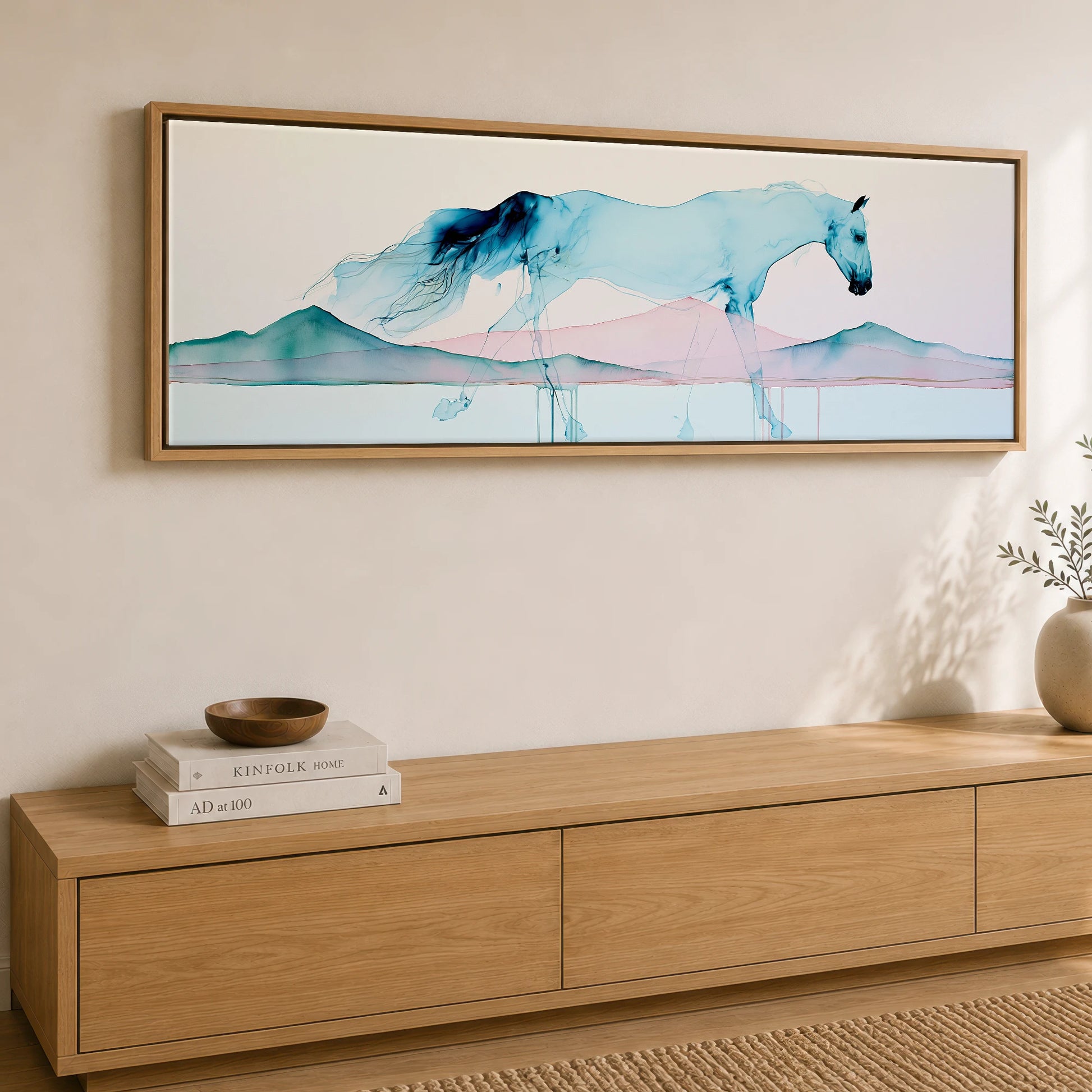 Ethereal Blue Stride Horse Landscape panoramic canvas wall art displayed above a sideboard