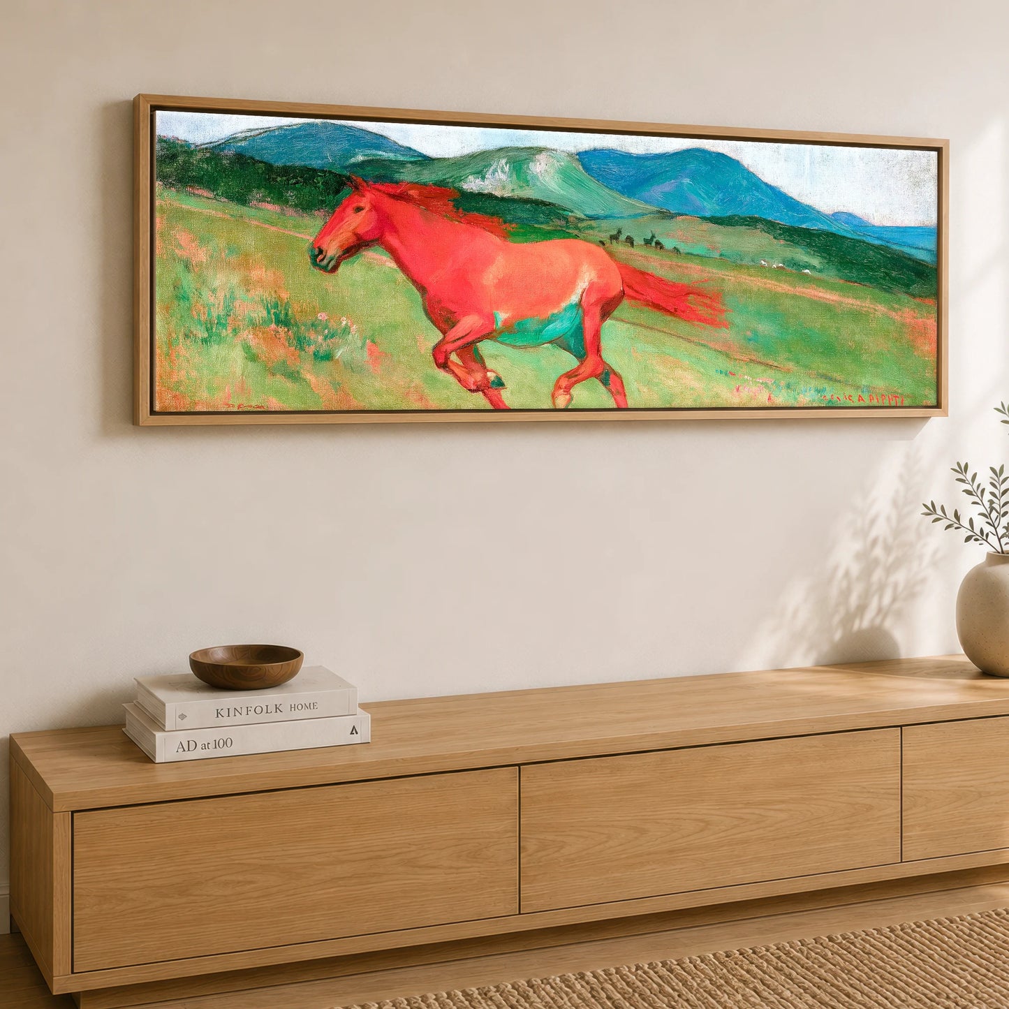 The Crimson Gallop Horse Landscape panoramic canvas wall art displayed above a sideboard