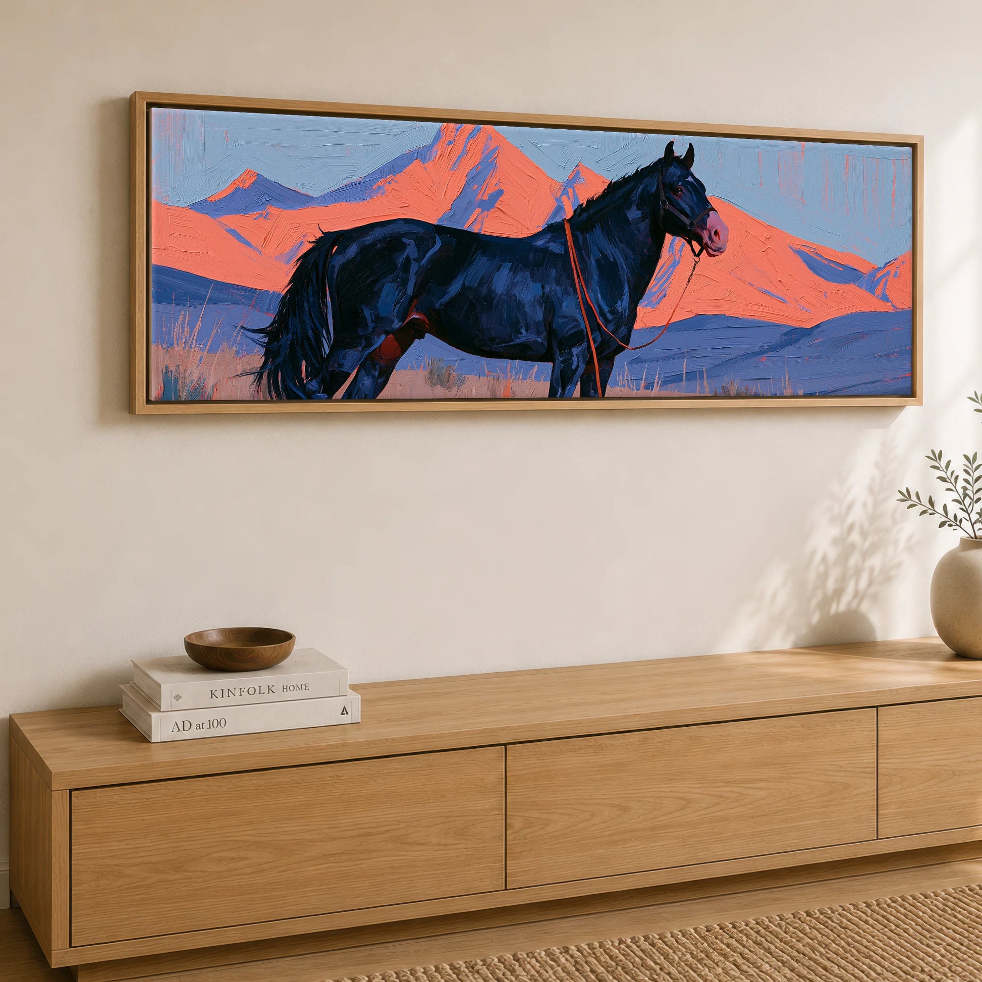 Coral Peaks and Indigo Horse Landscape panoramic canvas wall art displayed above a sideboard