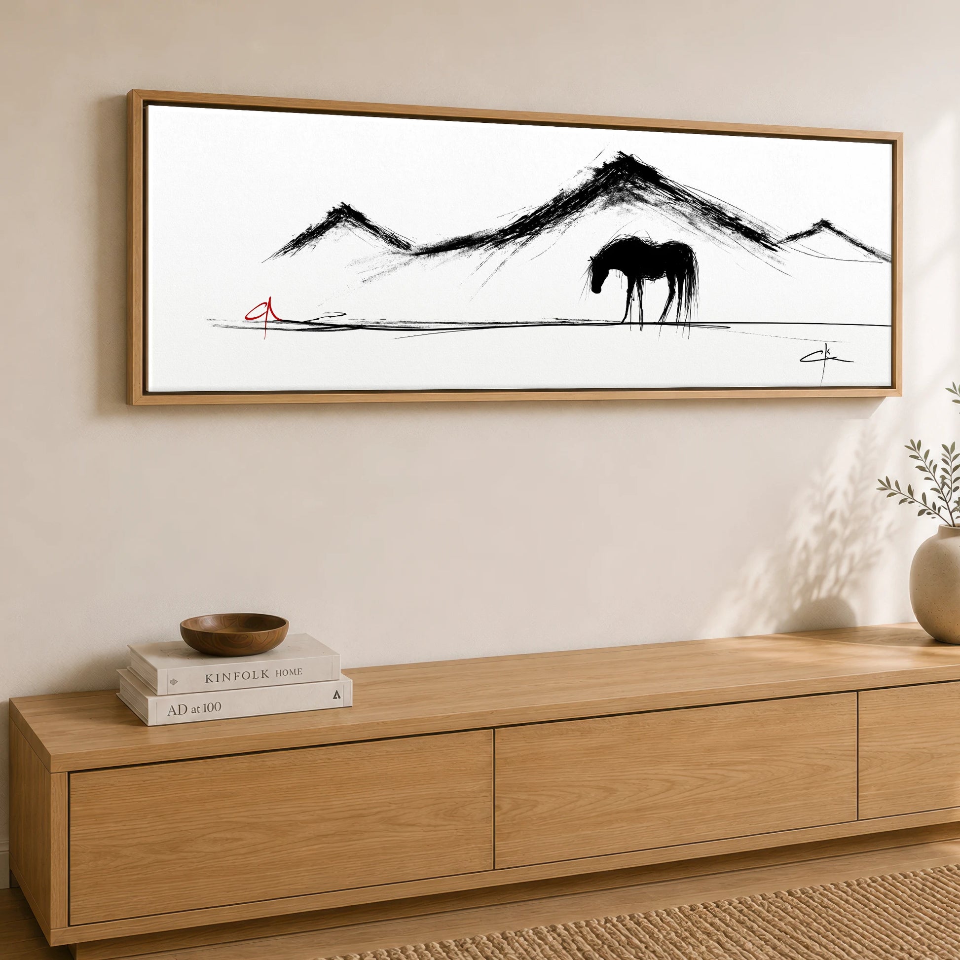 Silent Peaks Grazing Horse Landscape panoramic canvas wall art displayed above a sideboard