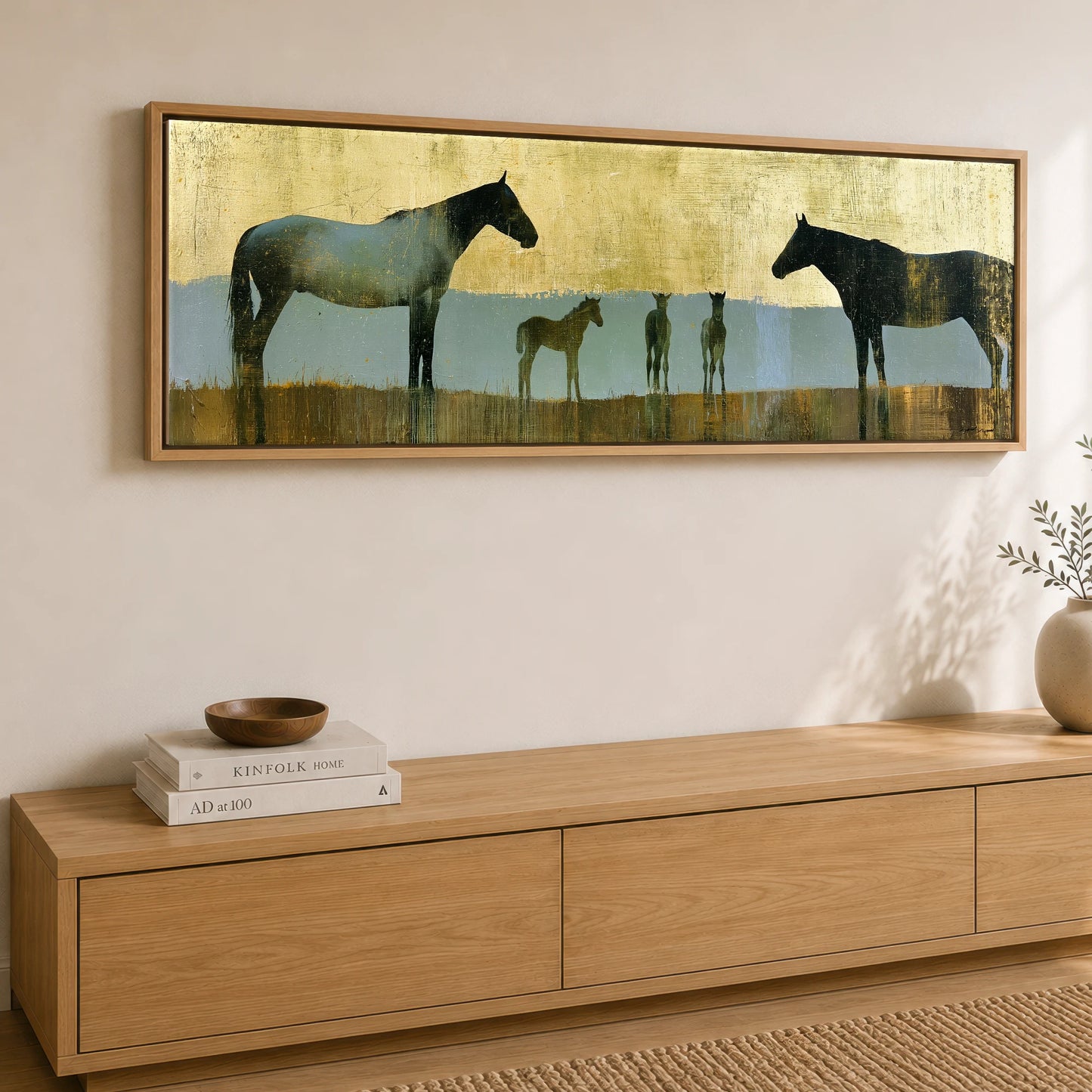 Gilded Pastures Mare & Foal panoramic canvas wall art displayed above a sideboard