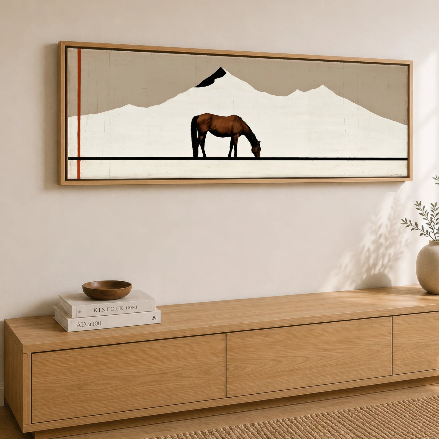 The Minimalist Pasture Horse Landscape panoramic canvas wall art displayed above a sideboard
