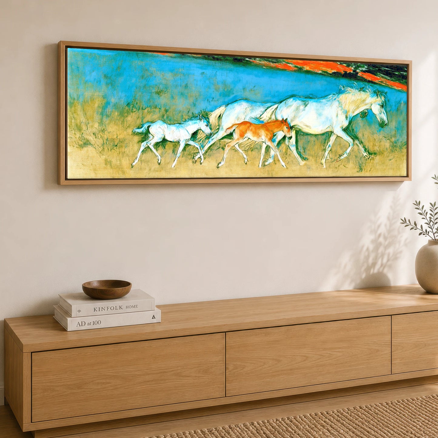 Vibrant Azure Strides Mare & Foal panoramic canvas wall art displayed above a sideboard