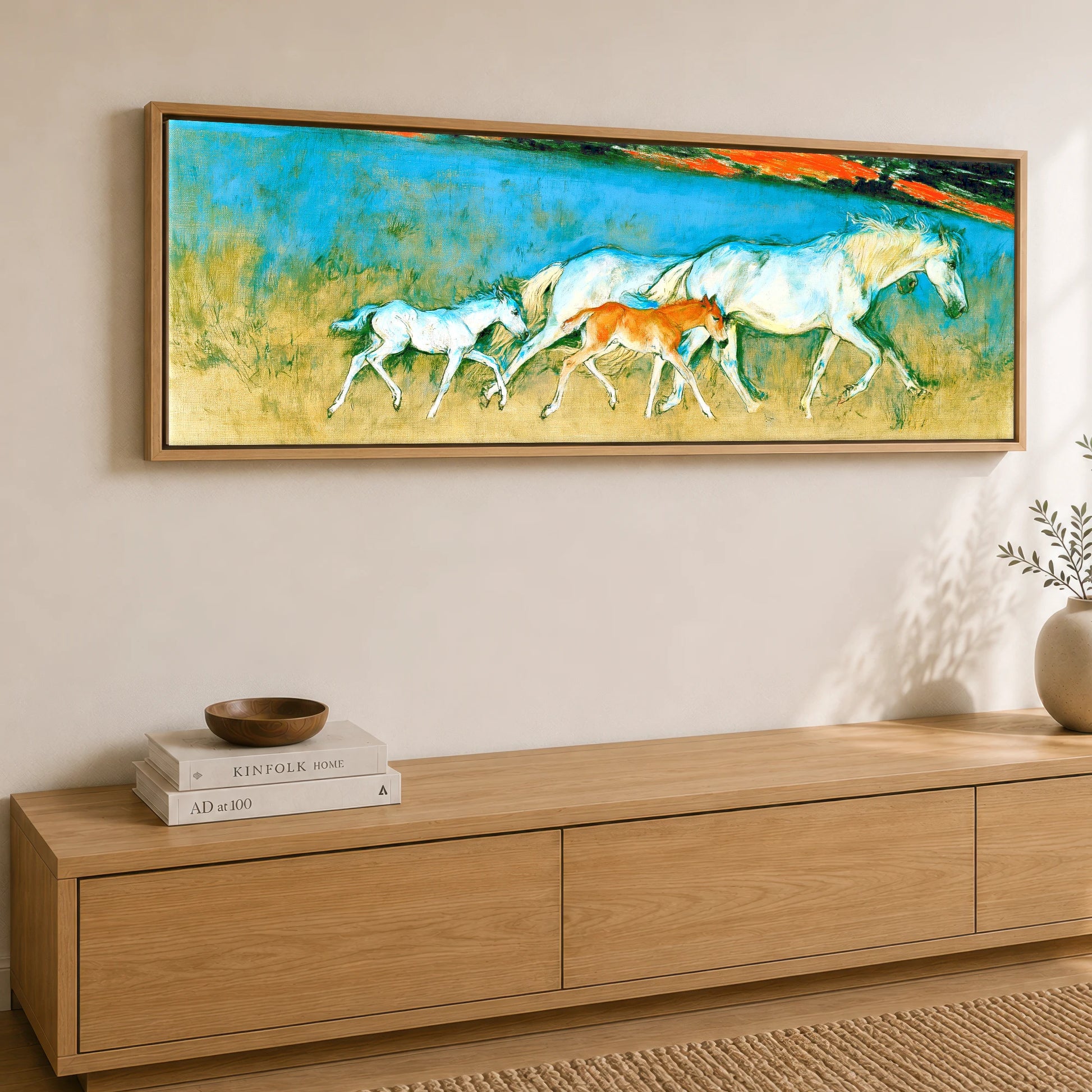 Vibrant Azure Strides Mare & Foal panoramic canvas wall art displayed above a sideboard