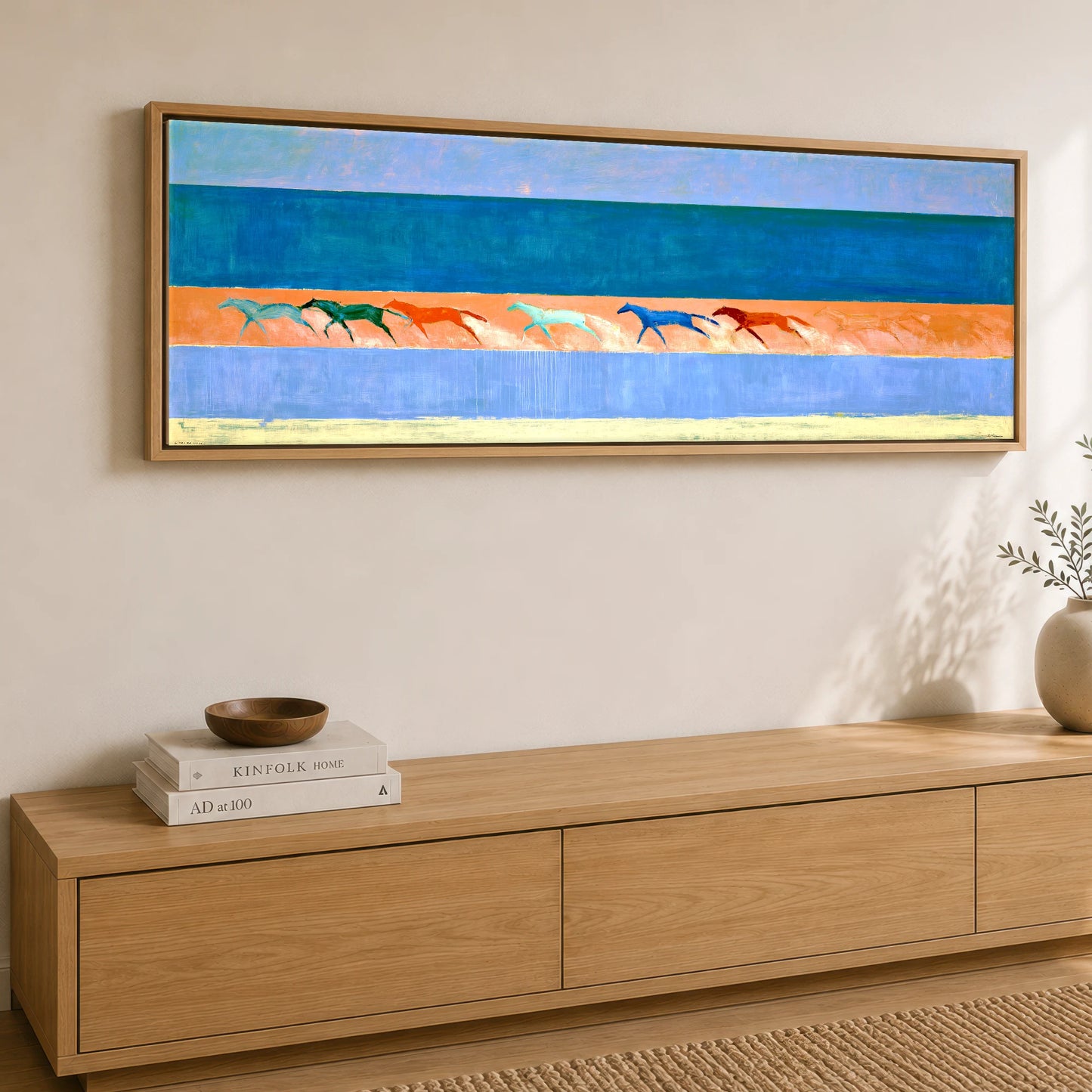 Rhythm of the Coast Beach Horse panoramic canvas wall art displayed above a sideboard