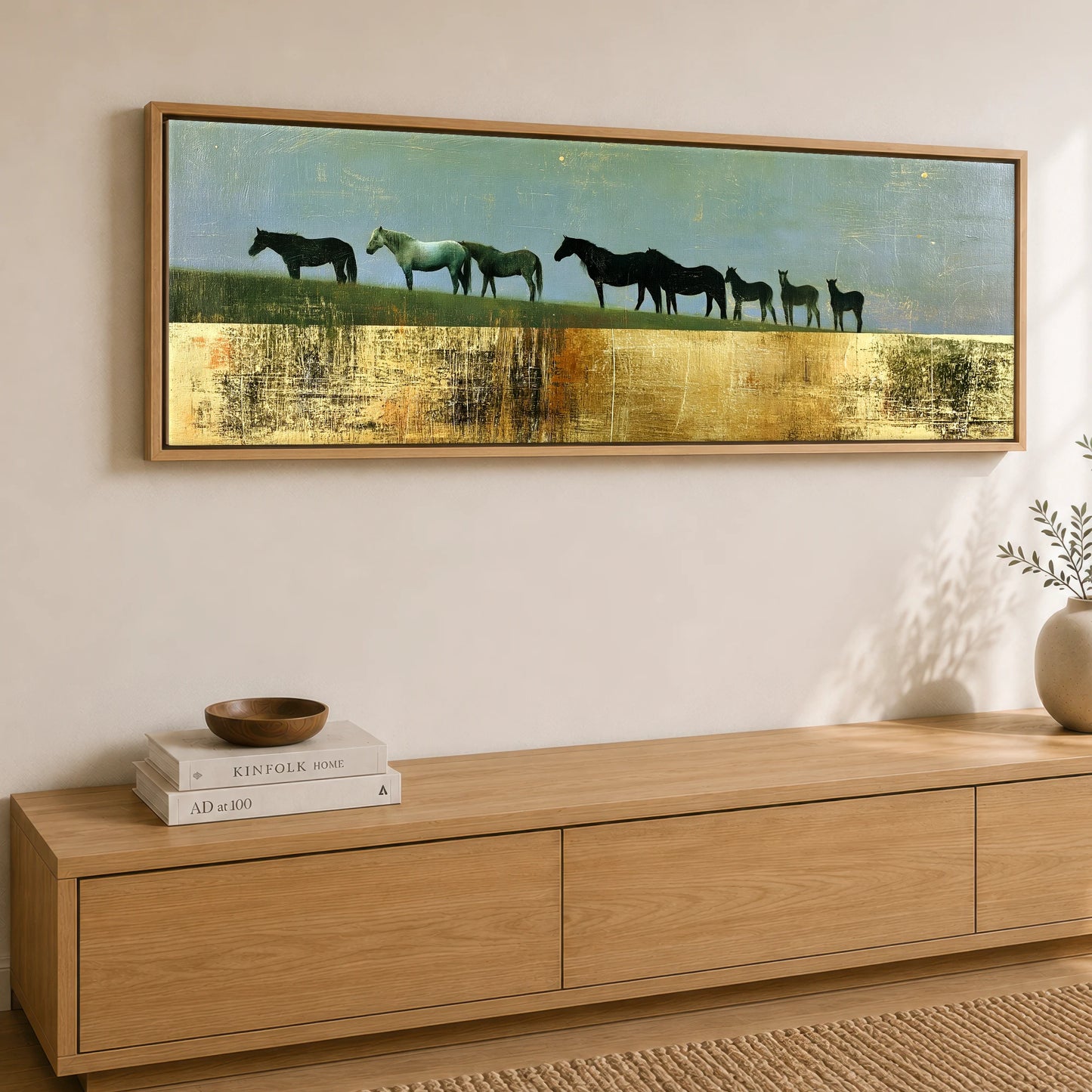 The Gilded Ridge Mare & Foal panoramic canvas wall art displayed above a sideboard
