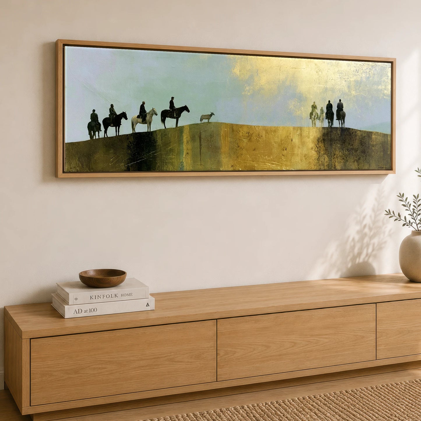 The Golden Ridge Horse & Rider panoramic canvas wall art displayed above a sideboard