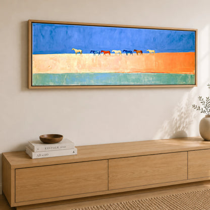 Nomads of the Horizon Wild Horses panoramic canvas wall art displayed above a sideboard