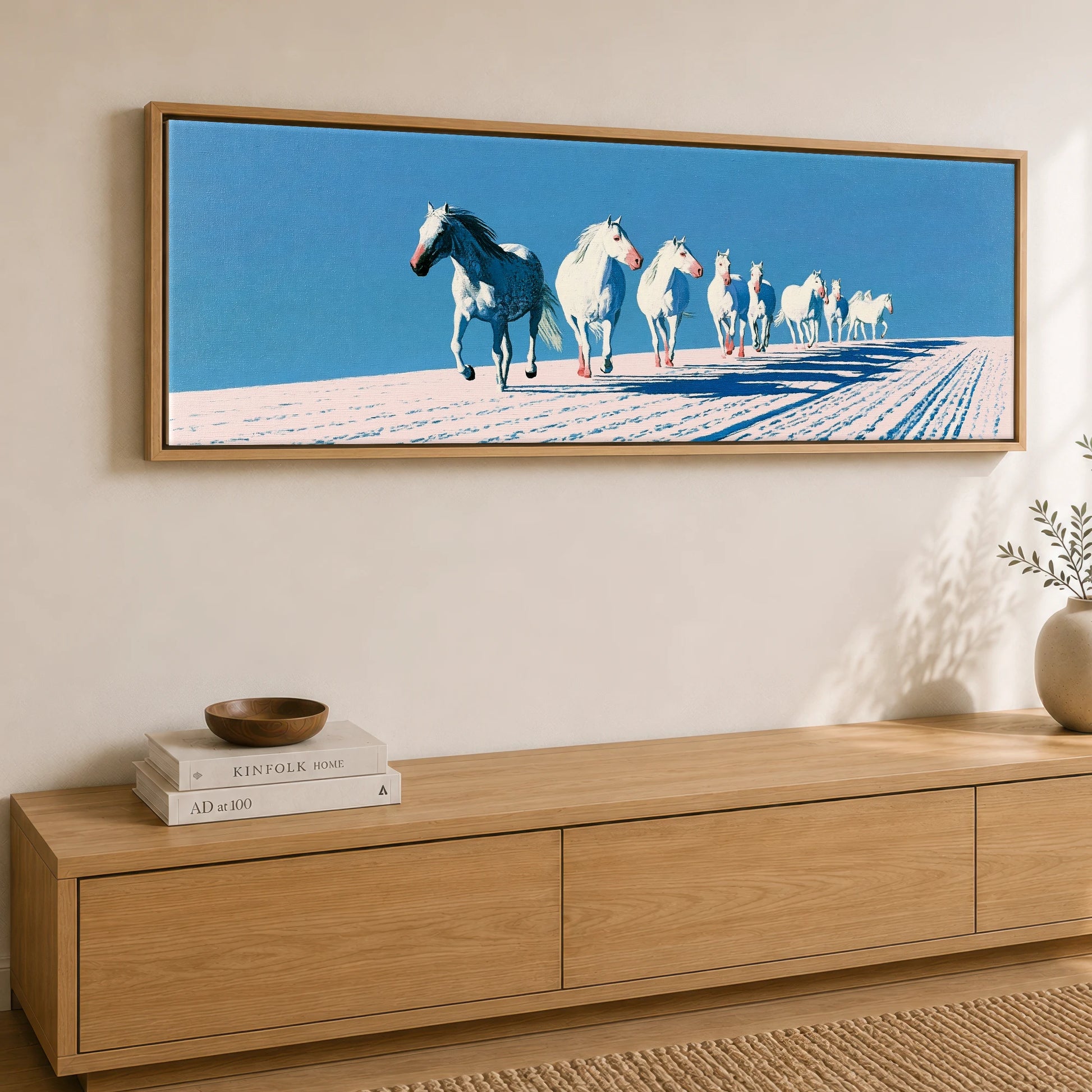Azure Winter Gallop Horse Landscape panoramic canvas wall art displayed above a sideboard