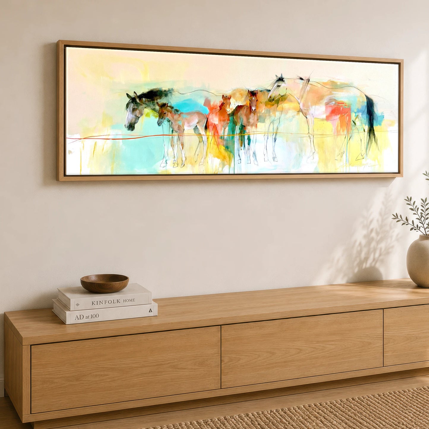 Vibrant Spring Herd Mare & Foal panoramic canvas wall art displayed above a sideboard