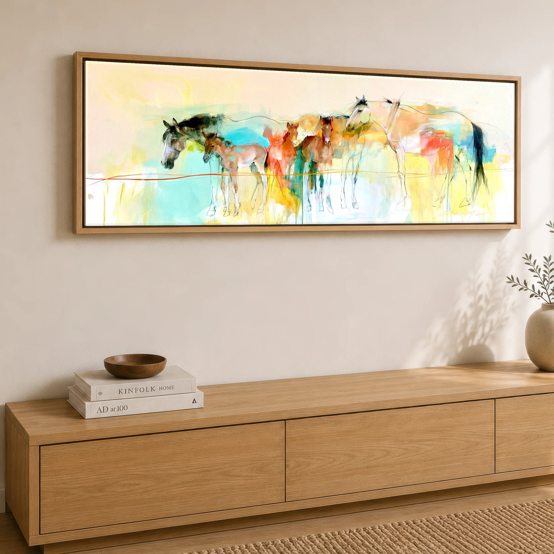 Vibrant Spring Herd Mare & Foal panoramic canvas wall art displayed above a sideboard
