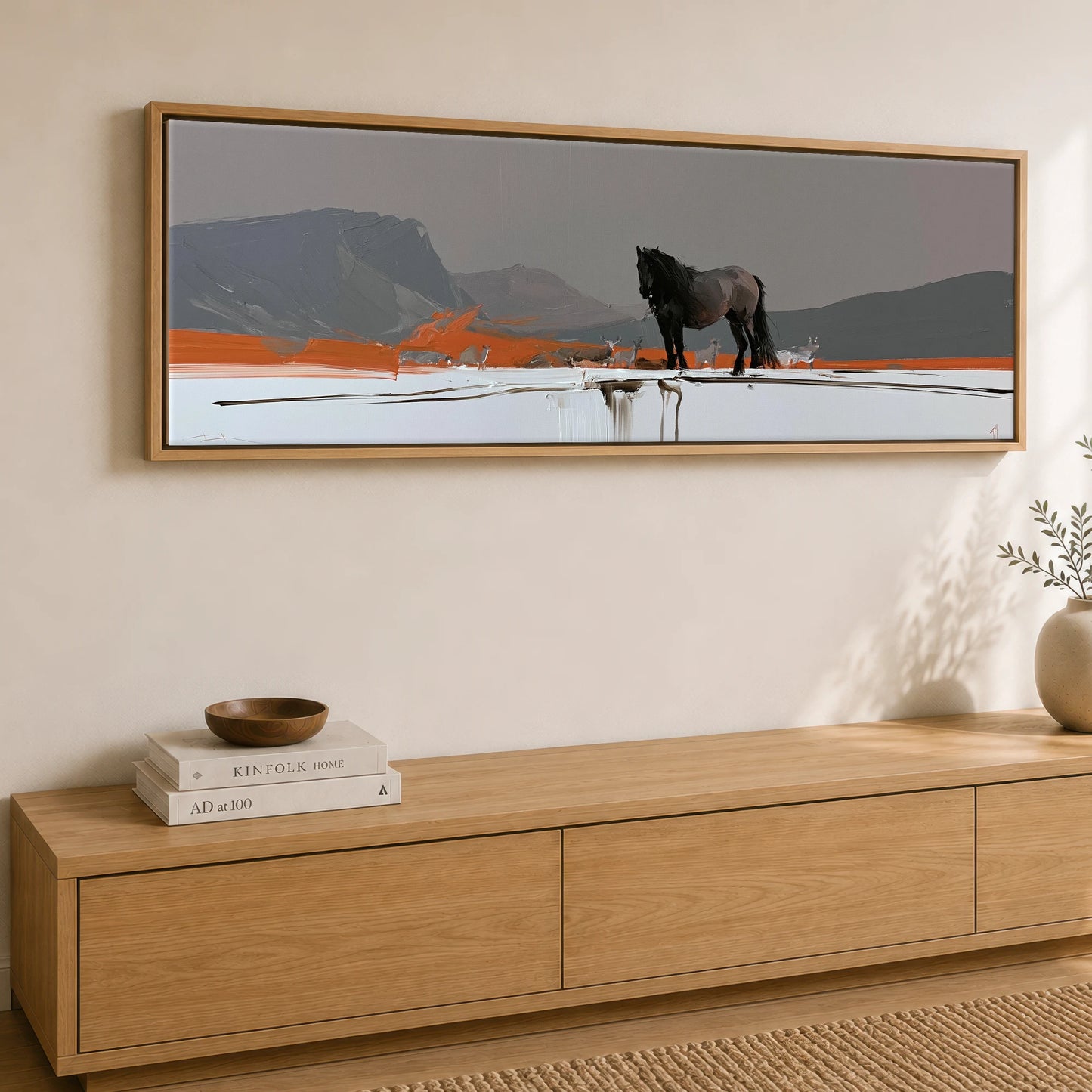 The Vivid Expanse Horse Landscape panoramic canvas wall art displayed above a sideboard