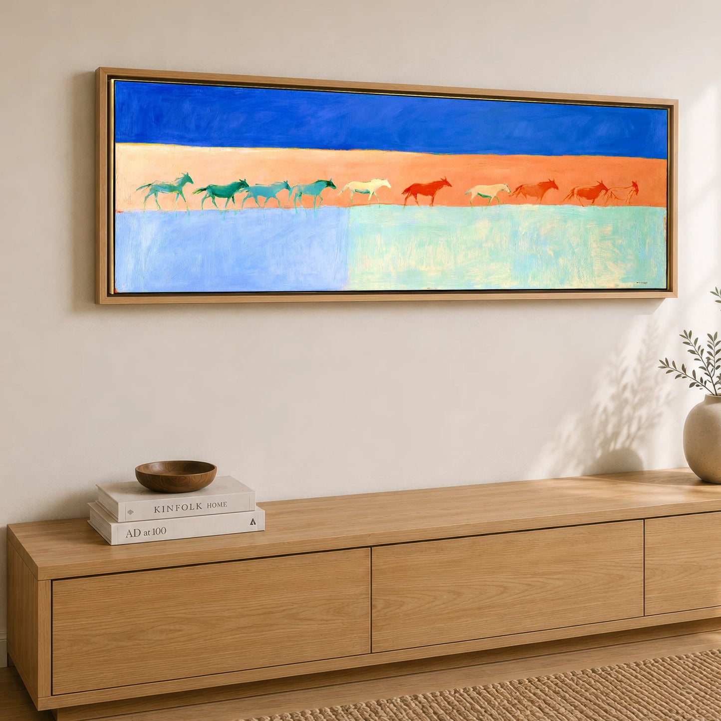 Bold Equine Horizon Horse Landscape panoramic canvas wall art displayed above a sideboard