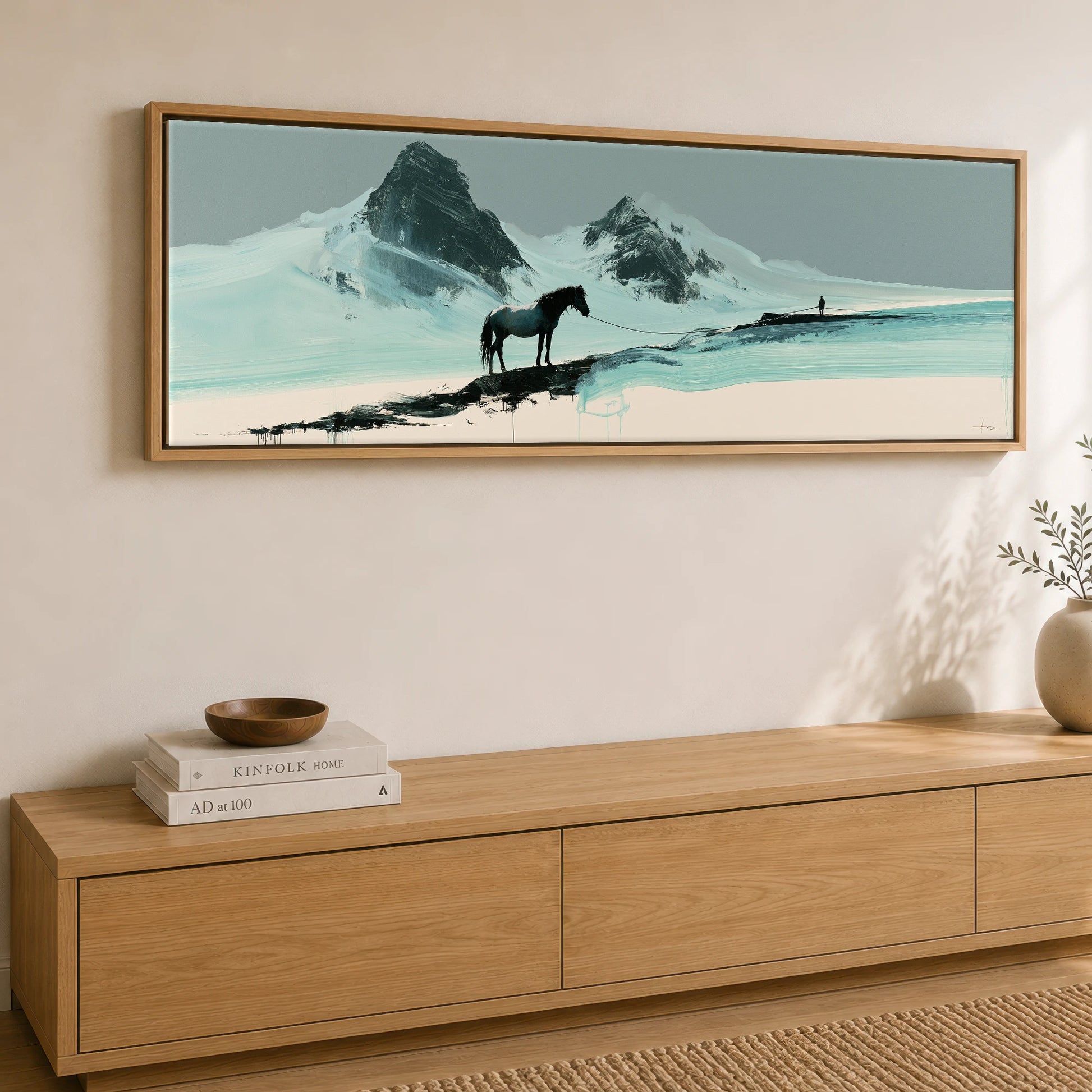 The Long Line Horse Landscape panoramic canvas wall art displayed above a sideboard