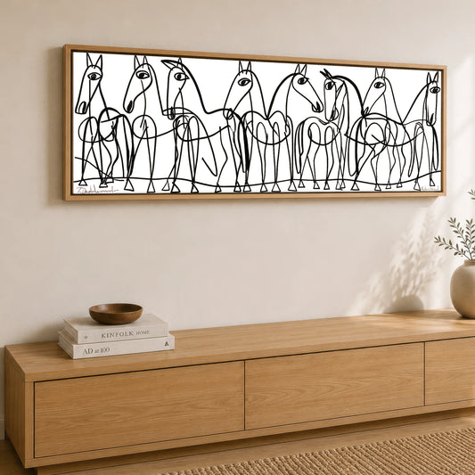 The Line Drawn Herd Horse Landscape panoramic canvas wall art displayed above a sideboard