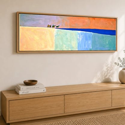 The Cobalt Horizon Horse & Rider panoramic canvas wall art displayed above a sideboard