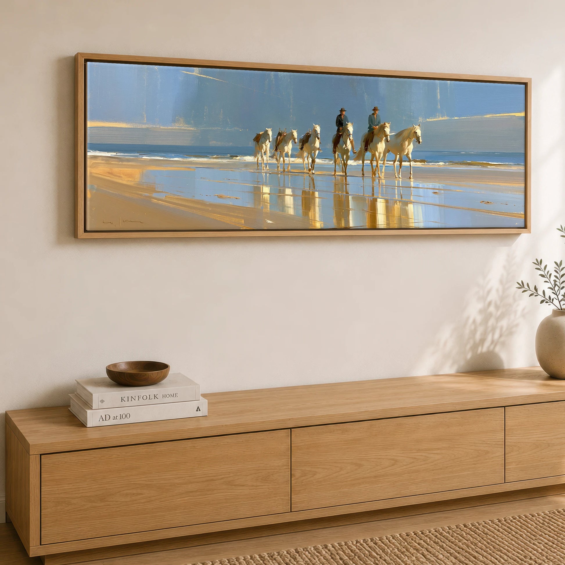 The Coastal String Horse Landscape panoramic canvas wall art displayed above a sideboard