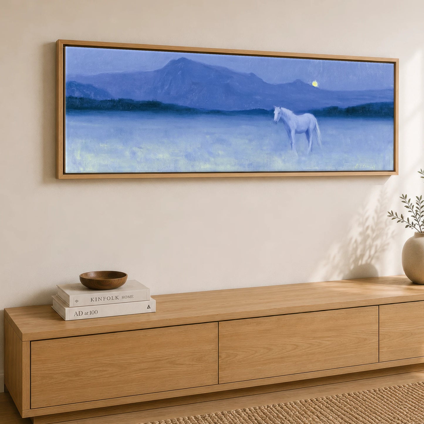 Solitary Grey Under Moonlight Horse Landscape panoramic canvas wall art displayed above a sideboard