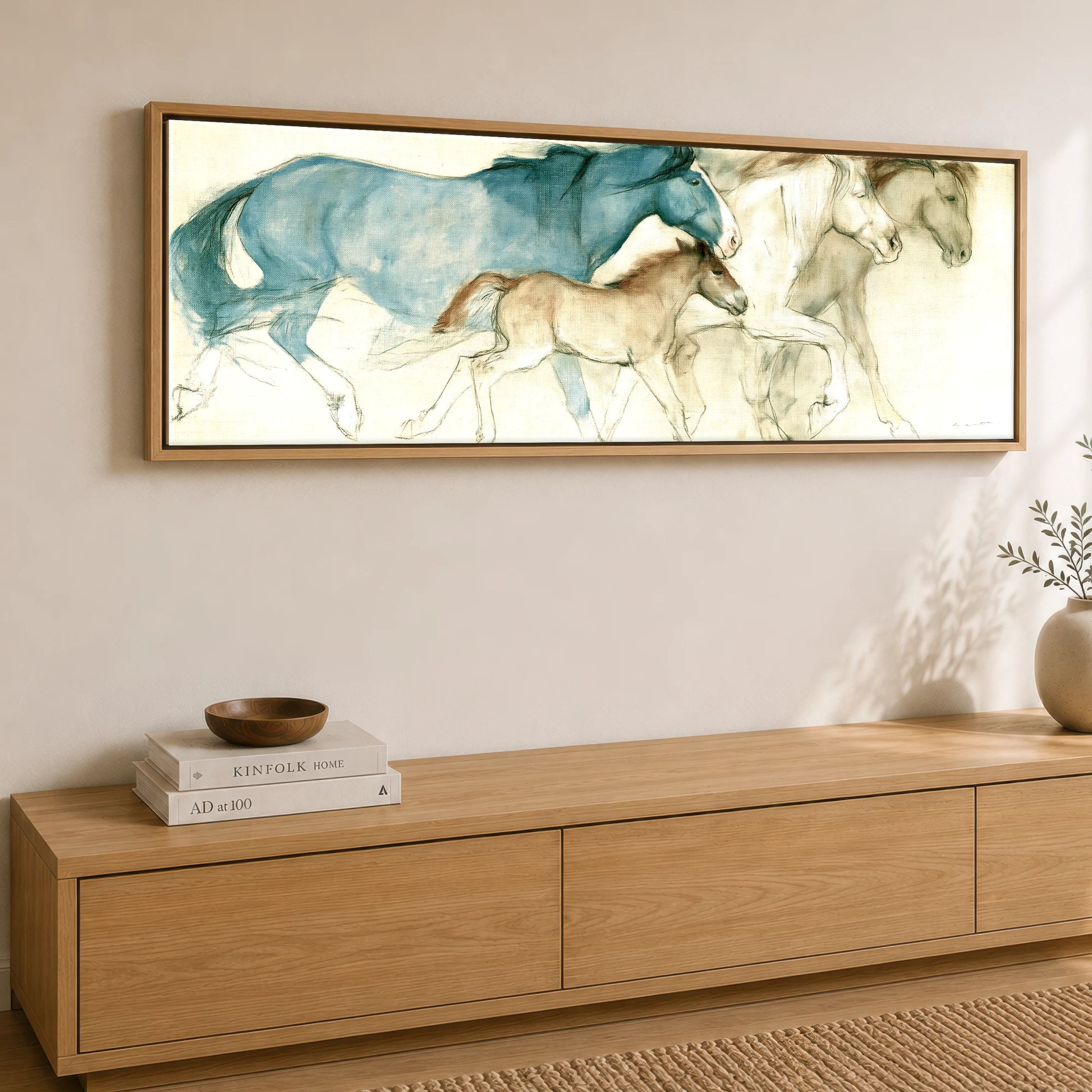 Azure Mare and Foal Mare & Foal panoramic canvas wall art displayed above a sideboard
