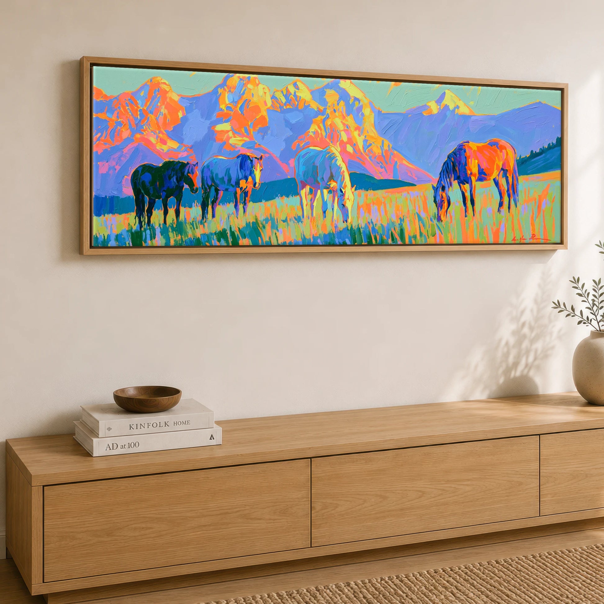 Painted Mountain Pasture Horse Landscape panoramic canvas wall art displayed above a sideboard