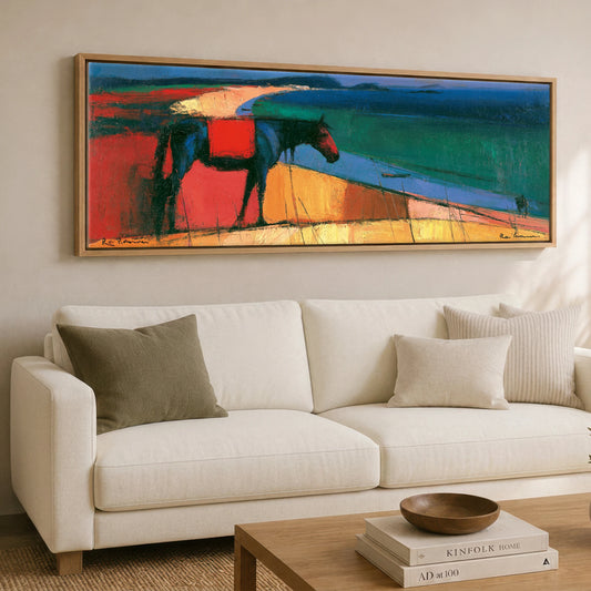 The Painted Shore Horse Landscape panoramic canvas wall art displayed above a sofa