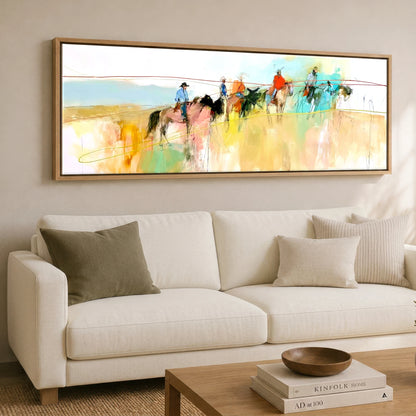Across the High Plains Horse & Rider panoramic canvas wall art displayed above a sofa