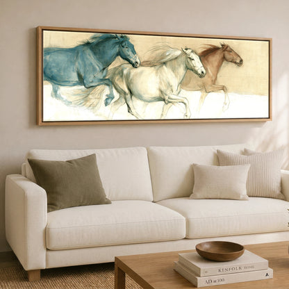The Three Strides Horse Landscape panoramic canvas wall art displayed above a sofa